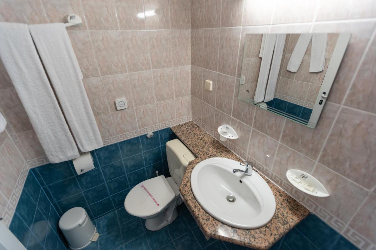 Hotel Azurro Pantai Sunny Bagian luar foto
